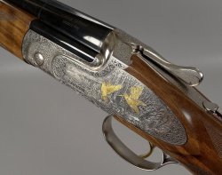 Gravuren der Caesar Guerini Magnus Light Gravur auf Flinte