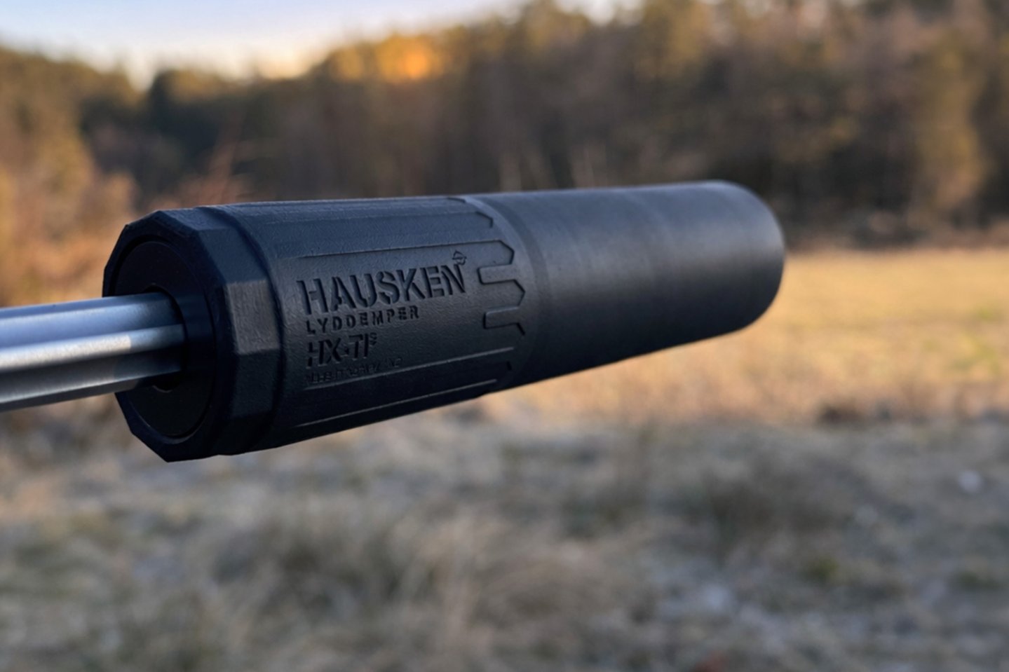 HAUSKEN HX-Ti3 auf der Mündung einer Büchse.