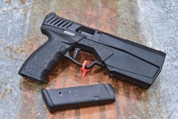 SilencerCo Maxim 9 Pistole mit integriertem Schalldämpfer Pistole SilencerCo Maxim 9 mit Magazin