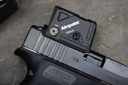 GLOCK 43X mit Aimpoint COA Rotpunktvisier.