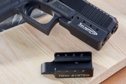 GLOCK-Tuning: Was bietet der Aftermarket für die legendäre Polymerpistole in 2021? Laufgewicht für die Mündungspartie einer GLOCK.