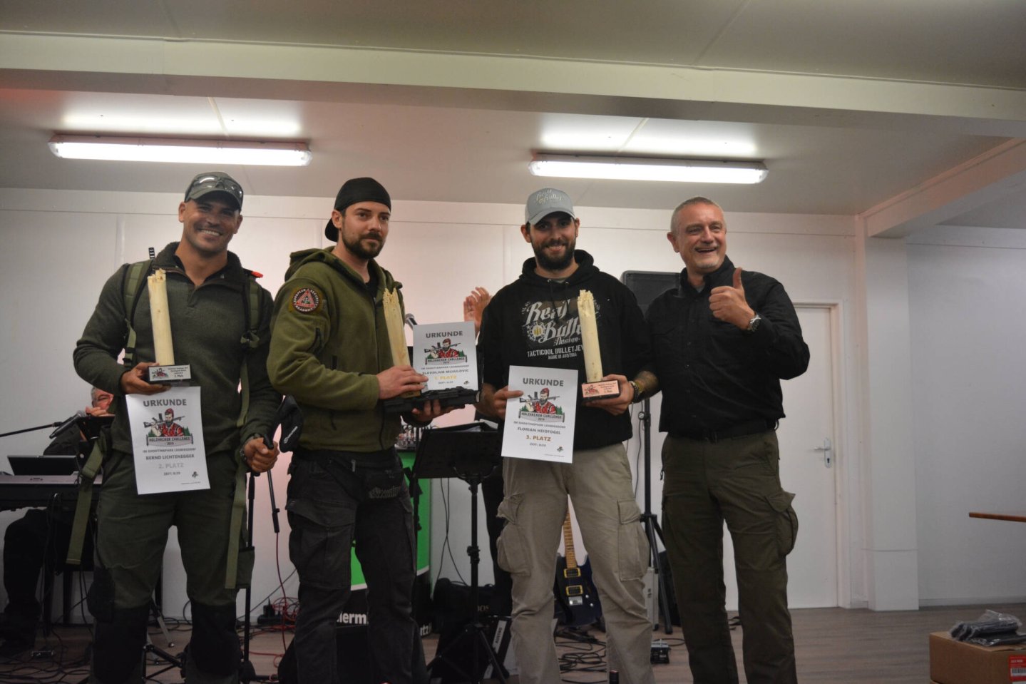 Holzhacker Challenge 2019 – der Nachbericht zur Veranstaltung von Schmeisser und GECO Austria Die Siegerehrung (v.l).: 2. Platz Bernd Lichtenegger, Sieger Slavoljub Mijailovic, 3. Platz Florian Heidfogel und Schmeisser-Geschäftsführer Thomas Hoff.