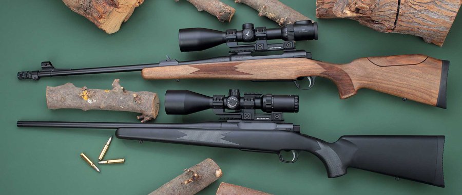 VISIER 11/2016 Orsis Hunter (oben) und Orsis 140 (unten) in linker Seitenansicht auf grünem Untergrund mit Holzscheiten.