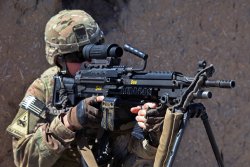 The US Army cancels the Interim Combat Service Rifle program Soldier shooting with the M249 Squad Automatic Weapon