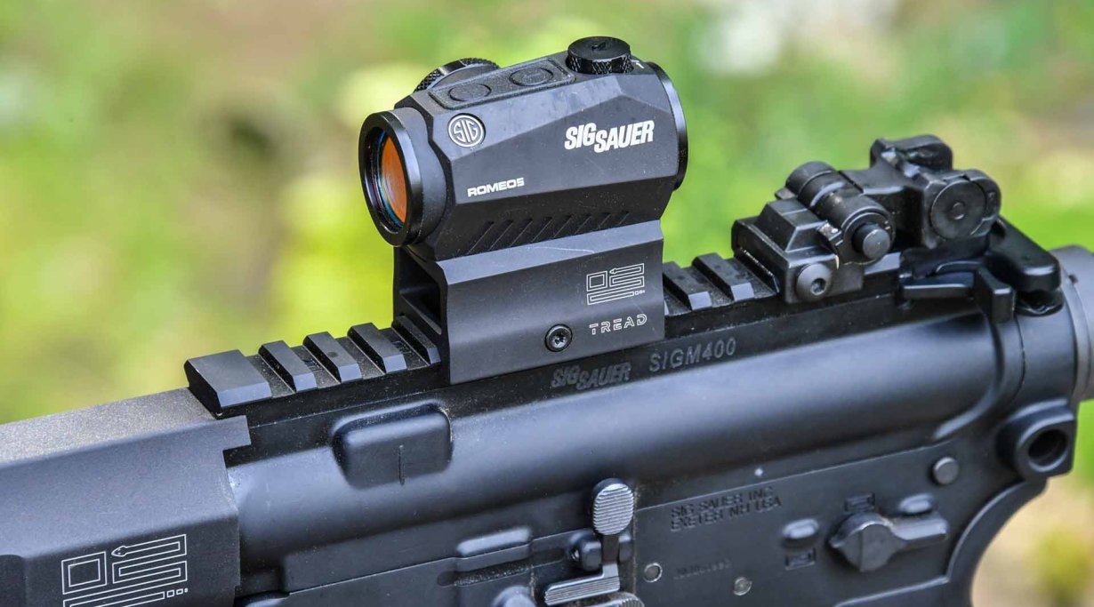 The SIG Sauer M400 TREAD rifle with a 2 MOA Red Dot optic mounted.