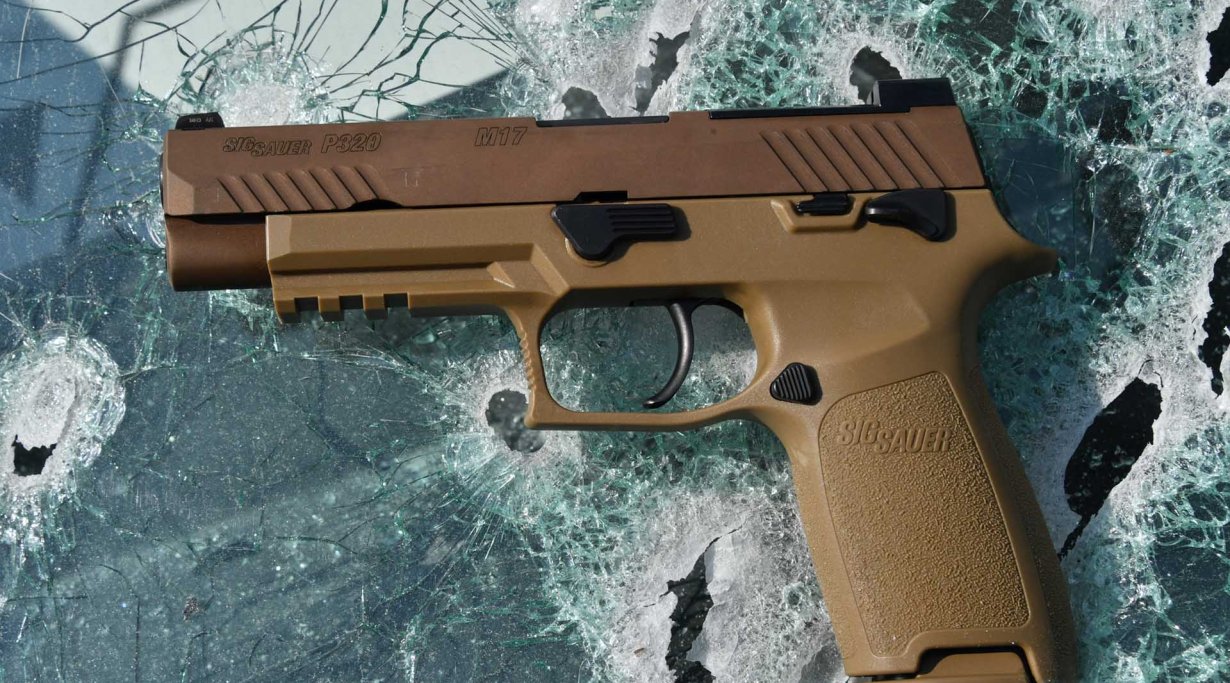 SIG Sauer P320-M17 pistol, left side.