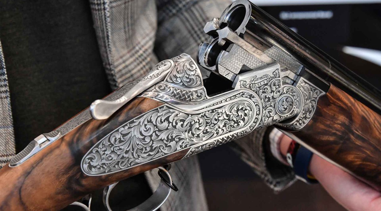 Richly engraved receiver of the Beretta SL3 hunting over-under