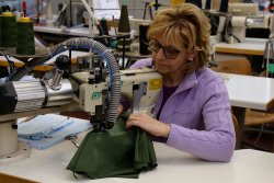 Forcetek: technical knitwear for hunters and shooters Seamstress at work at Forcetek company