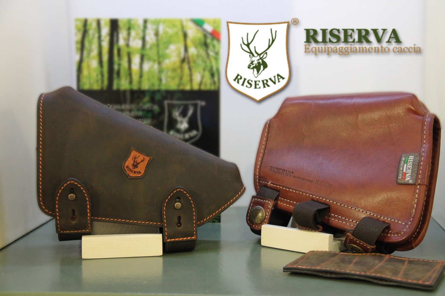 Riserva: leather hunting accessories Riserva leather accessories: Hunting belt and ammo holders at a booth.