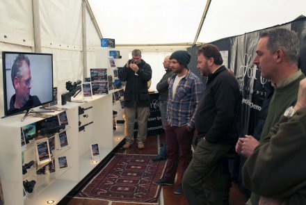 Deerstalking Fair 2018 in Scotland Visitors looking at night vision scopes at the Deerstalking fair