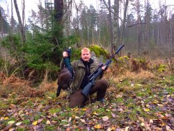Dream Hunt: affordable hunting in Sweden Hunter with capercaillie cock bird.