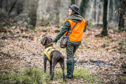 Dream hunt: Hunting with pointers in the Netherlands Huntres holding dog and Beretta S55