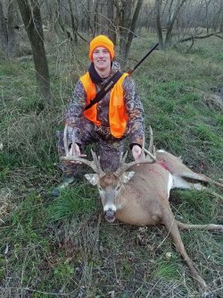 White-tailed Deer hunting in Illinois, USA Hunter with his 171 inch buck.