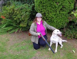Lady hunter Hanna Higginbotham Lady hunter with Beretta 12 gauge over and under and her gundog.
