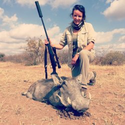 A Scottish Lady Hunter Cara Richardson and a Warthog taken with Winchester Shadow .243.