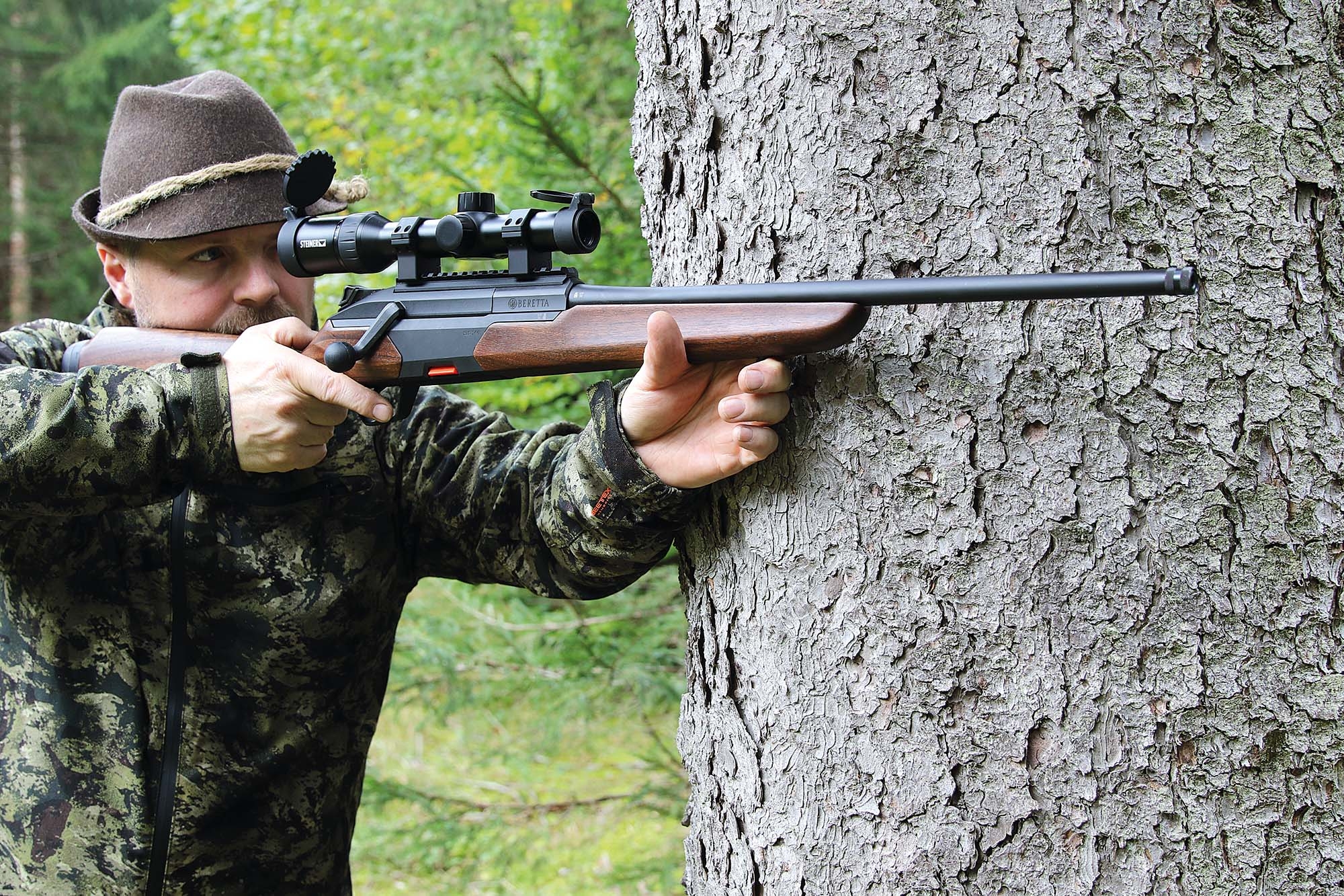 beretta: Modern technology in a classic walnut stock design: Beretta BRX1 bolt action rifle with wooden set