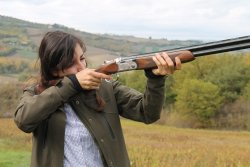 Beretta Vittoria over-unders: shotguns for shooters and hunters Lady hunter with Beretta Vittoria over-under