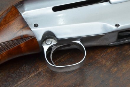 The Belladonna semi-auto shotgun The safety button of the Belladonna semi-auto shotgun