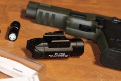Olight PL-PRO Valkyrie, a powerful and inexpensive gun flashlight The Olight PL-Pro Valkyrie flashlight