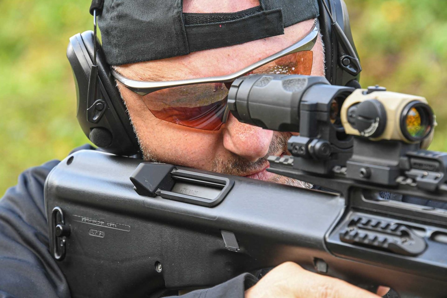 The Corvus Defensio Case Deflector installed on a Steyr AUG A2 SA semiautomatic rifle