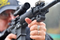 MantisX firearms training system The MantisX mounted on a railed forend of a .223 M4 carbine.