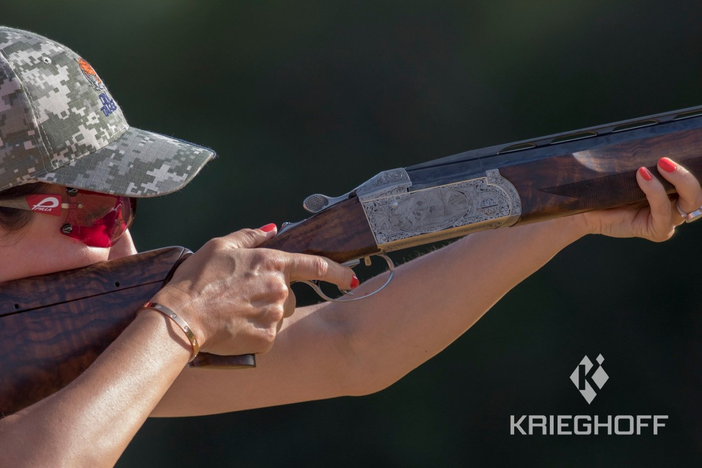 Inna Aleksandrova with Krieghoff shotgun
