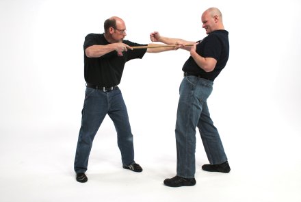 Self-defense and unarmed defense part 9 - Advanced stick techniques The tip of the stick into the aggressor's chest