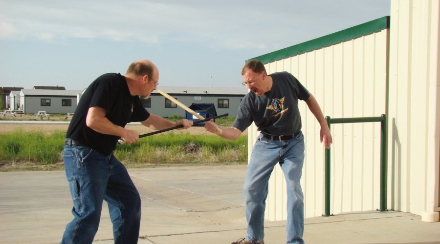 Stick practice: painful encounter for the aggressor