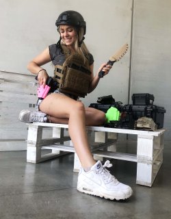 A young gun influencer: interview with Danielle Valkyrie Danielle Valkyrie posing with holsters and cases by the Austrian manufacturer Black Trident