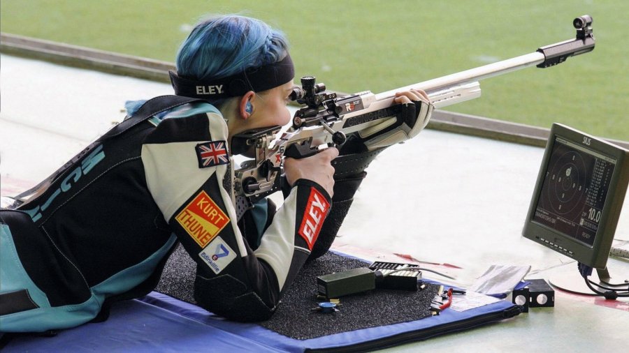 Prone shooting Seonaid McIntosh with monitor