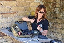 The Tactical Corner: How to salvage guns and ammo in case of flooding Girl cleaning firearms
