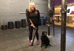 An unstoppable lady clay shooter Tori Clinch with her Beretta 692 and Tiva, a black labrador gundog