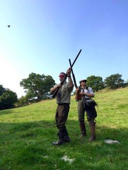 Lady clay shot and instructor Clay Pigeon Shooting at Roxburghe Shooting School