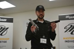SIG Sauer Range Day at the IWA 2019: Mastershop Sport - Prestige - Individual Armin Dobat from SIG Sauer with two SIG Sauer P226 X-Six pistols.