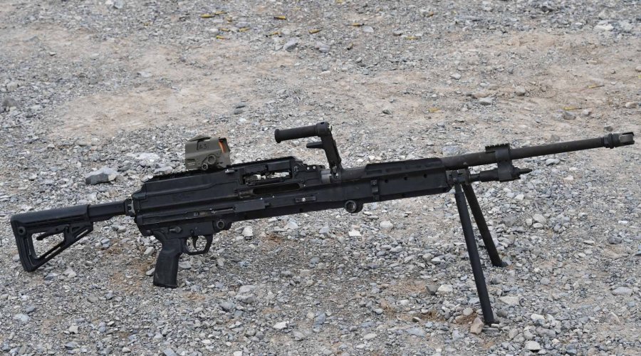 The new SIG Sauer belt-fed SLMAG Machinegun in .338NM with a Romeo 8T red dot sight was mounted on the top rail.