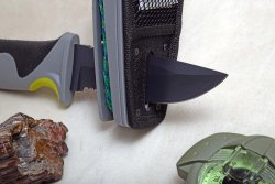 The Camillus Stroud S.K.Mountain Knives Sharpener in the sheath opening