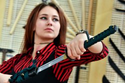 Cold Steel Dragonfly Wakizashi sword Girl holding the Dragonfly Wakizashi sword by Cold Steel