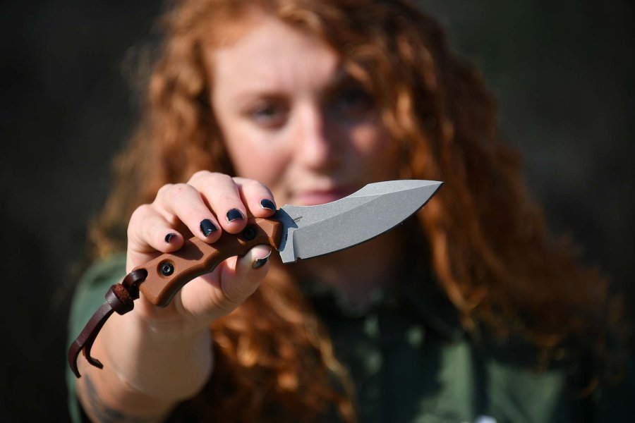 The CRKT Bugsy with G10 handle and a black Cerakote finish