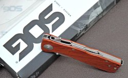 SOG Twitch knife The lockback system features a safety cursor that blocks the button and locks the blade closed and open