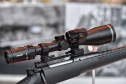 Minox Micro RV, new red dot sight The Minox Micro RV red dot sight tandem-mounted on a scope.