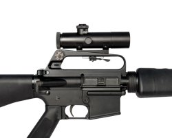 Retro 4x Carry Handle Optic by Brownells, for “old-style” AR-15s Retro 4x Carry Handle Optic scope attached to AR-15 rifle