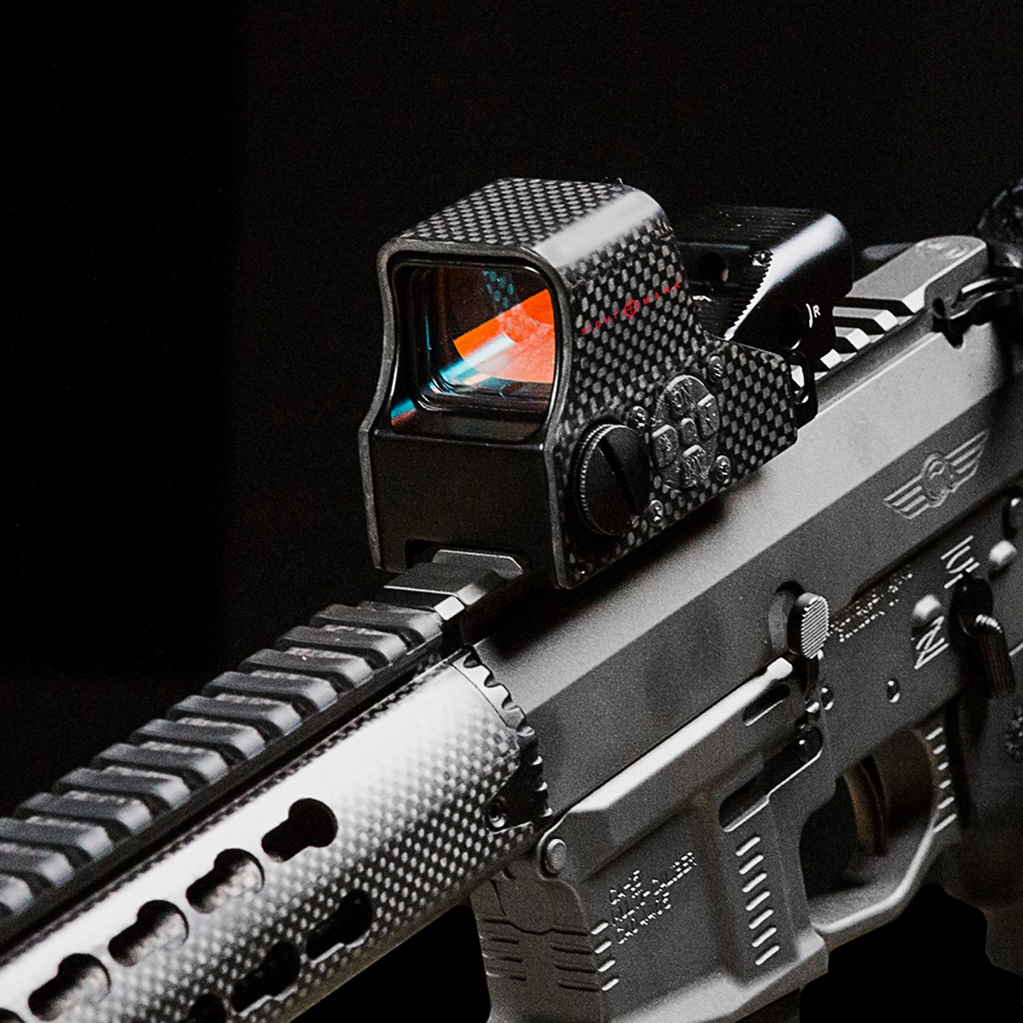 Sightmark introduces the new Ultra Shot M-Spec FMS Carbon Fiber Reflex Sight Ultra Shot M-Spec FMS Carbon Fiber Reflex Sight by Sightmark mounted on a rifle