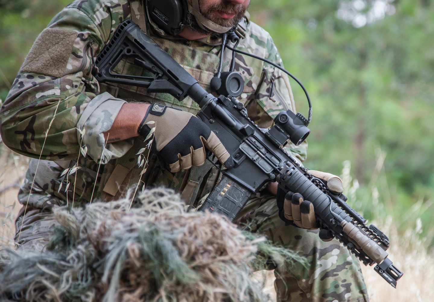 Trijicon MRO: Miniature Rifle Optic Trijicon, Inc. introduces the MRO red-dot miniature rifle optic