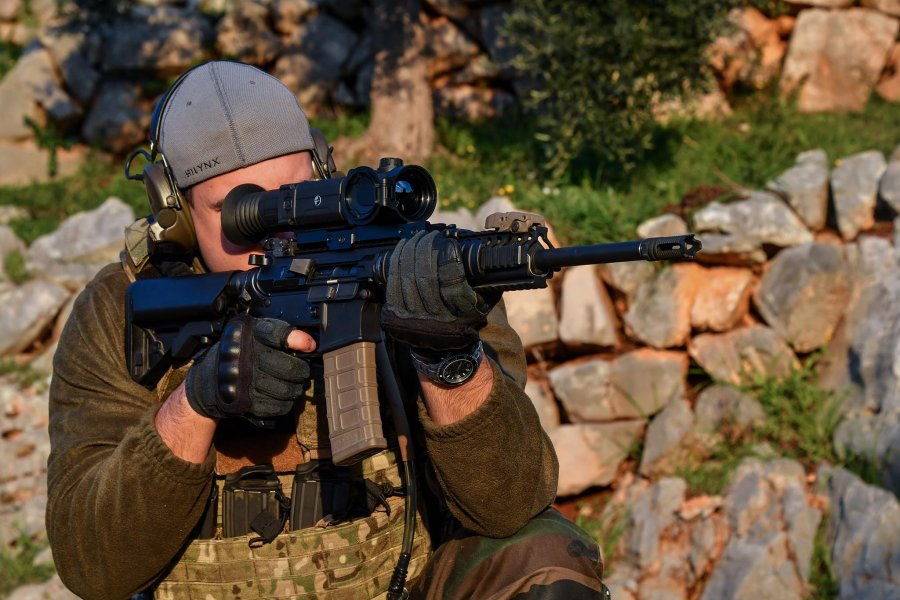 Yukon/Pulsar Helion, Trail and Digisight Ultra at Milipol 2017 Pulsar Trail XP riflescope mounted on an M4 semiautomatic rifle