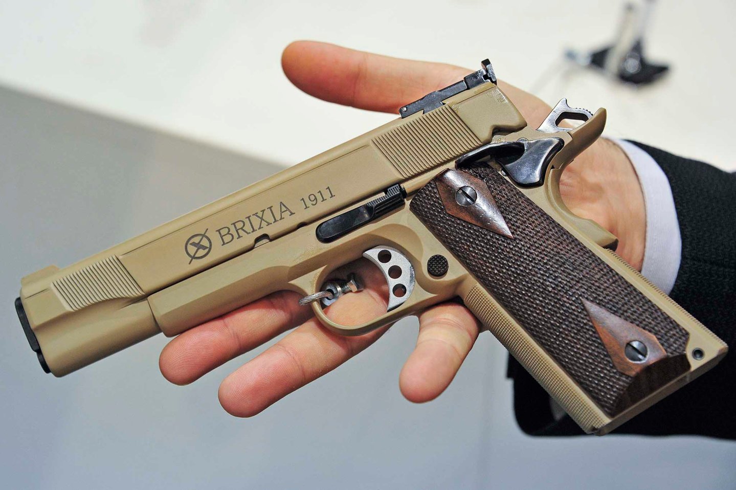 Brixia Shotguns: new pistols and shotguns for 2016 Brixia Shotguns S.r.l. introduced the 1911 line of .45 ACP semi-automatic pistols and the SK2.0 line of 12-gauge pump-action shotguns at the 2016 HIT Show