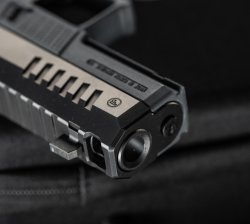 The large port near the muzzle of the CZ P-10 C Ported COA