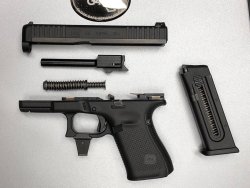 GLOCK 44, something big has come up! The GLOCK 44 field-stripped