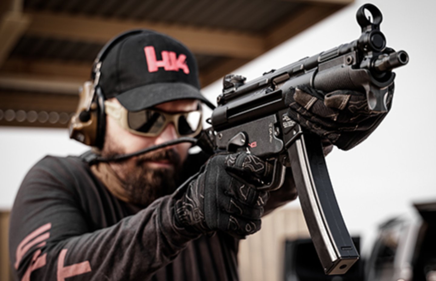 Man shooting with the Heckler & Koch SP5K-PDW pistol