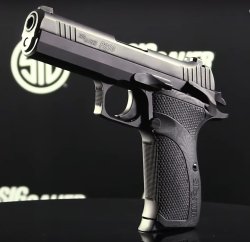 A “gentlemen's carry gun”: new SIG Sauer P210 Carry The slim low-profile black Hogue G10 grips
