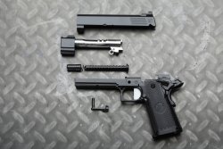 Nighthawk Custom 1911 and 2011: .45 ACP Agent 2 and 9mm TRS Comp pistols under test Nighthawk Custom TRS Comp disassembled